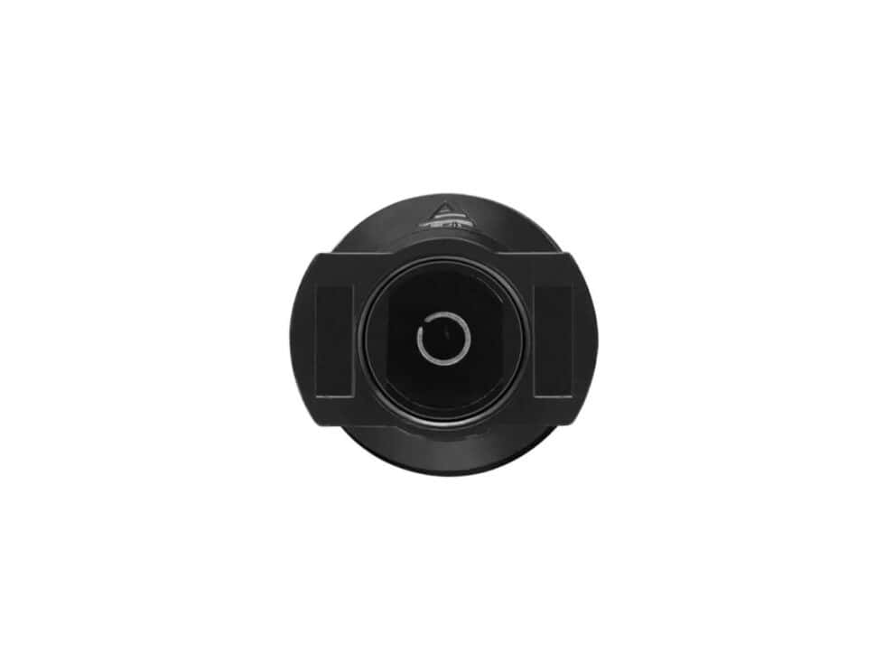 Black round surveillance camera front view.