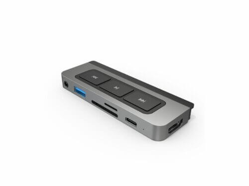 USB-C multiport adapter with media controls on white background.
