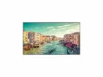 Venetian canal with gondola and colorful buildings.
