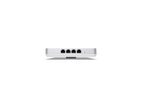White Wi-Fi router on black background.