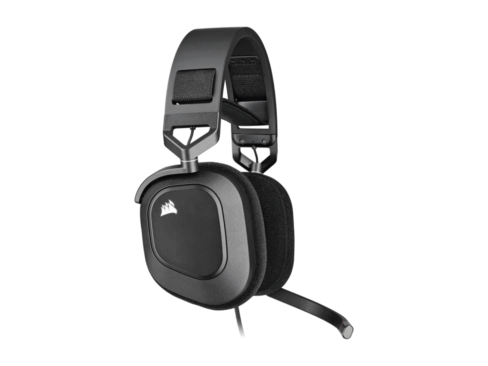 Black gaming headset on a black background.