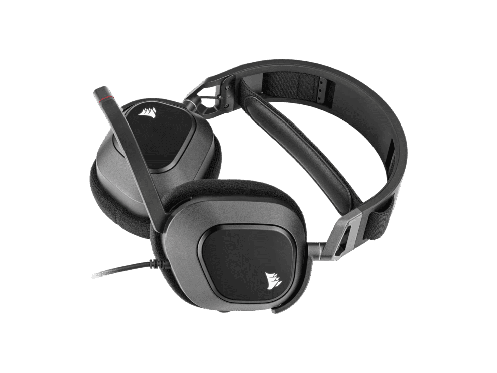 Black gaming headset with microphone on dark background.