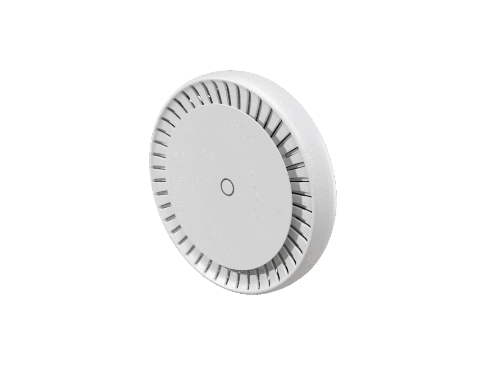 White smoke detector on black background.