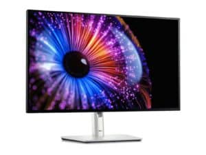 Dell monitor displaying colorful abstract wallpaper.