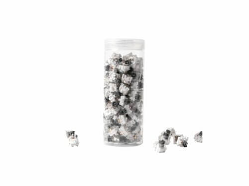 Clear container filled with keyboard switches.