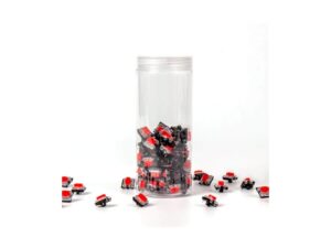 Clear container filled with small red and black components.