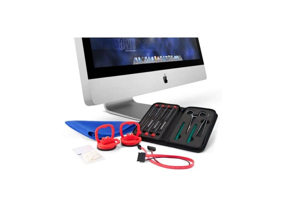 iMac with repair tools and disassembly kit.