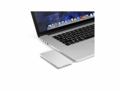 Laptop with external trackpad on white background