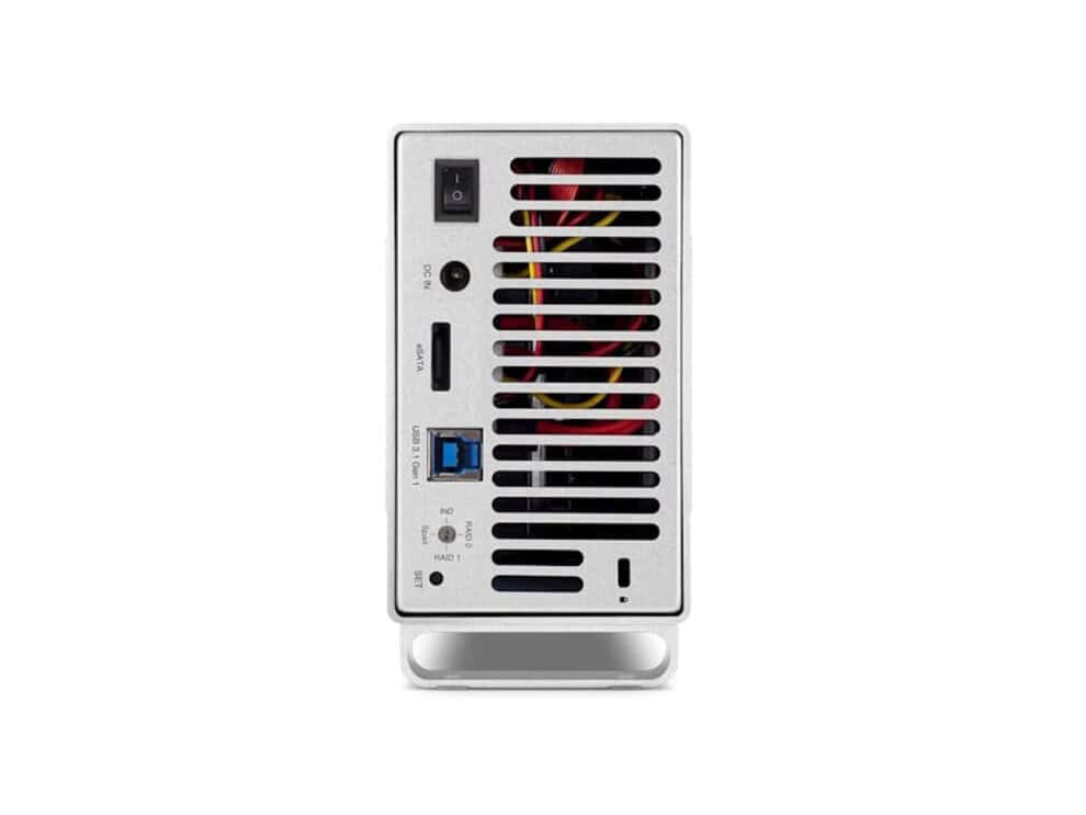Compact desktop server unit with ports and ventilation grille.