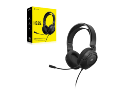 Black gaming headset with microphone and packaging.