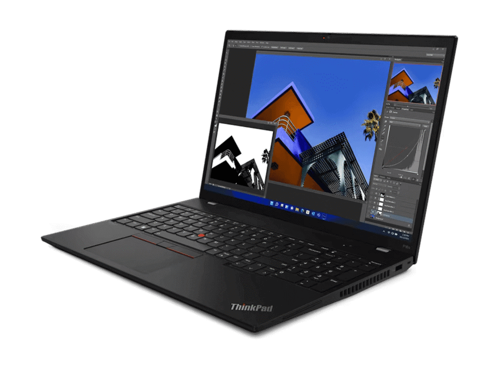 Laptop displaying graphic design software on screen.