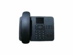 Black desk phone with keypad and screen