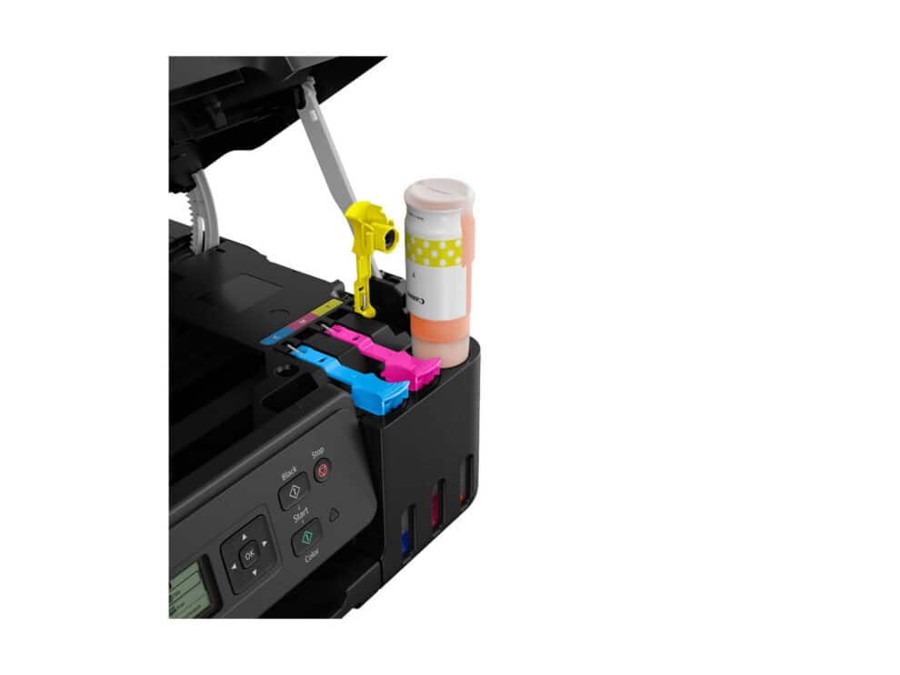 Printer with ink bottle inserted in cartridges.