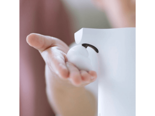 Foam soap dispenser in use