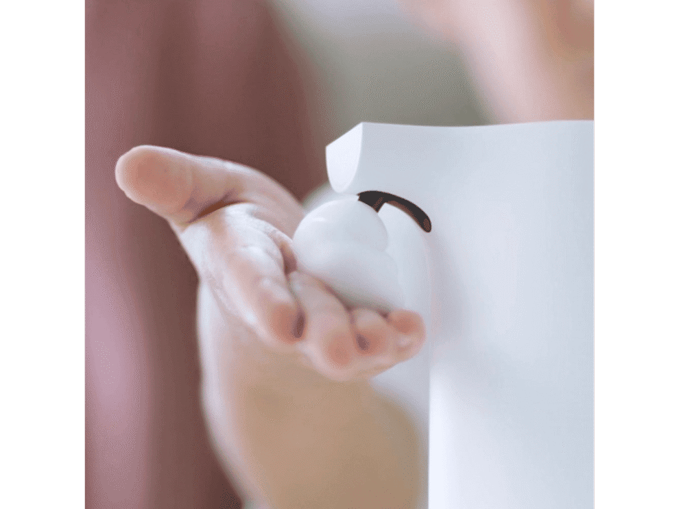 Foam soap dispenser in use