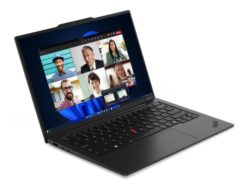 Laptop on video call with multiple participants.