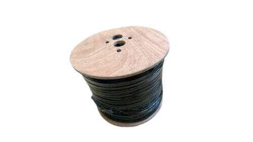Wooden spool filled with black cable