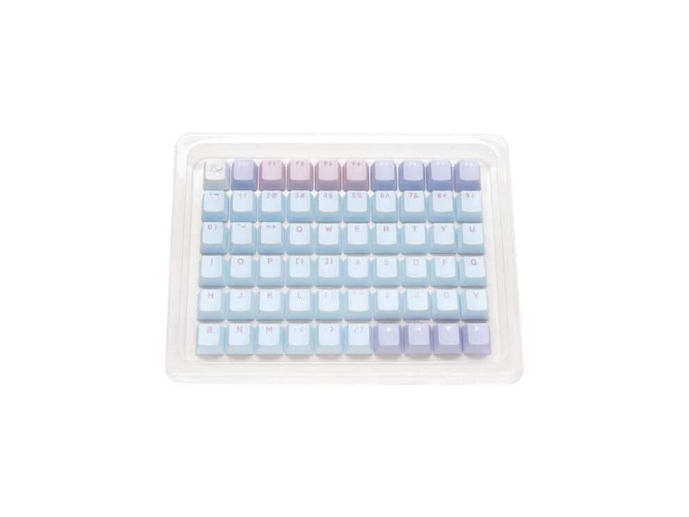 Pastel-color keyboard keycaps in tray