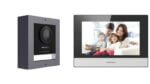 Hikvision doorbell and monitor with family image.